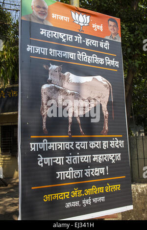 Mumbai, Maharashtra, India. 11th Mar, 2015. 11 March 2015 - Mumbai, INDIA:.A Poster put up by the ruling Political Party the BJP at Goregaon proclaims the decision to ban Cow slaughter as 'Historic' © Subhash Sharma/ZUMA Wire/ZUMAPRESS.com/Alamy Live News Stock Photo