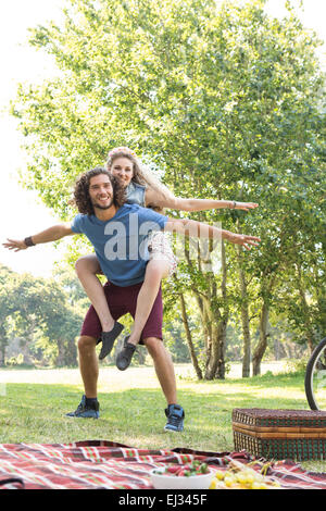 Cute couple having a picnic Stock Photo