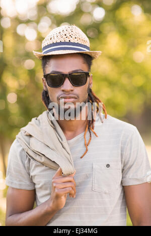 Handsome hipster in the park Stock Photo