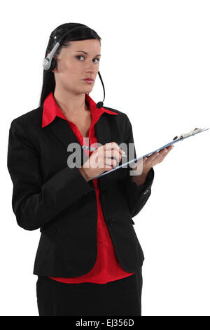 Brunette call-center worker Stock Photo