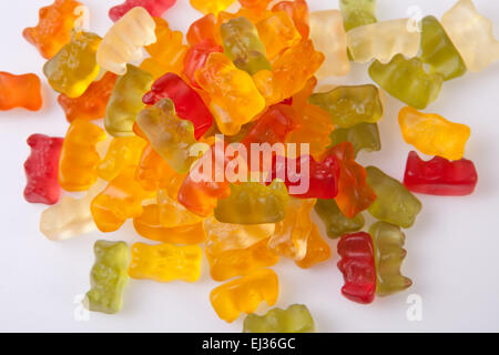 Pile of colorful gummy bears isolated over white background Stock Photo