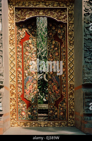 Travel Photography - Beautiful art on Hindu temple doors in Ubud in Bali in Indonesia in Southeast Asia Far East. Eastern Stock Photo