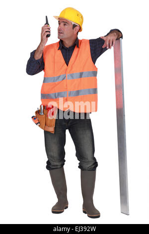 Foreman using talkie walkie Stock Photo