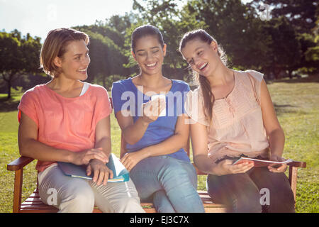 Students studying outside on campus Stock Photo