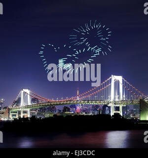 heart sparkle Fireworks celebrating over Tokyo Rainbow Bridge at Night, Odaiba, Japan Stock Photo