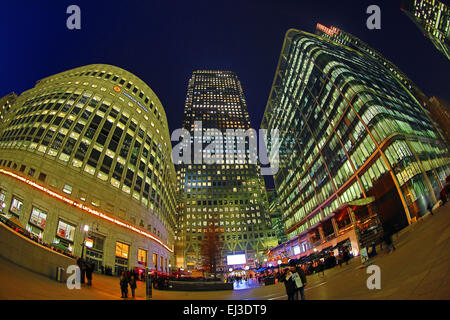 Office buildings and skyscrapers including One Canada Square around Canary Wharf at sunset, Isle of Dogs, London, England Stock Photo