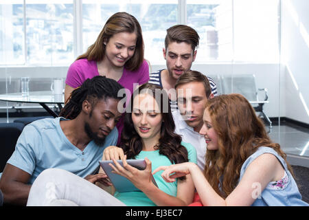 Students using digital tablet Stock Photo