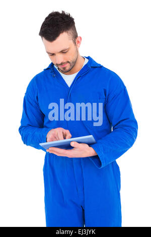 Mechanic pointing on digital tablet Stock Photo