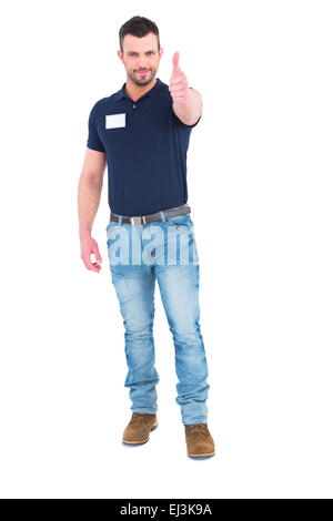 Male technician gesturing thumbs up Stock Photo