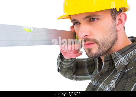 Carpenter using spirit level Stock Photo