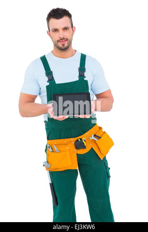 Construction worker holding tablet pc Stock Photo