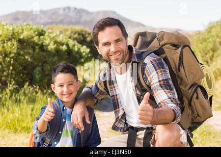 Father and son on a hike together Stock Photo