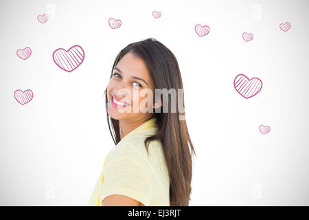 Composite image of happy casual woman smiling at camera Stock Photo