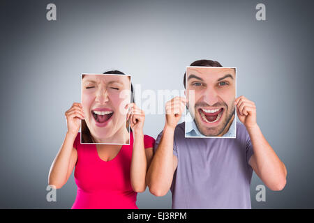 Composite image of cheering man looking at camera Stock Photo