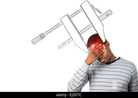 Composite image of stressed man with hand on his forehead Stock Photo