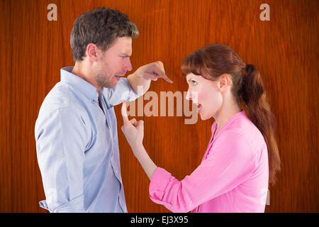 Composite image of couple arguing with each other Stock Photo