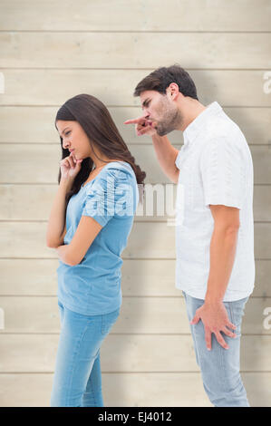 Composite image of angry man shouting at girlfriend Stock Photo
