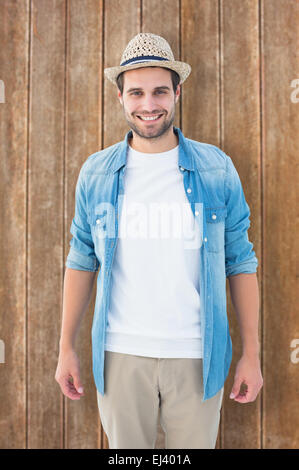 Composite image of handsome hipster smiling at camera Stock Photo