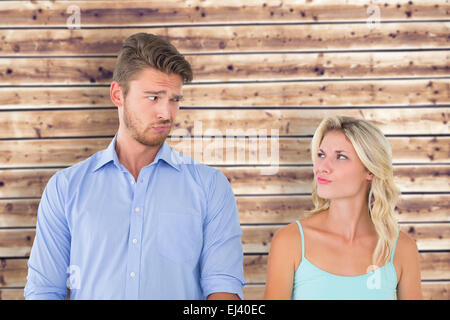 Composite image of young couple making silly faces Stock Photo