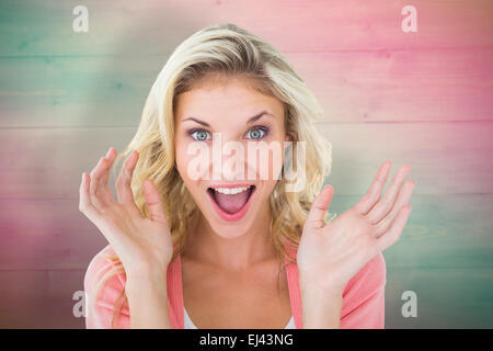 Composite image of pretty young blonde feeling surprised
