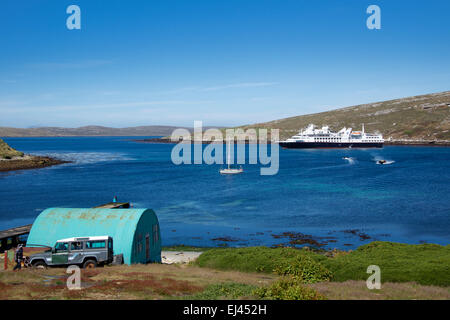 Farm estate with moored cruise ship West Point Island Falkland Islands Stock Photo