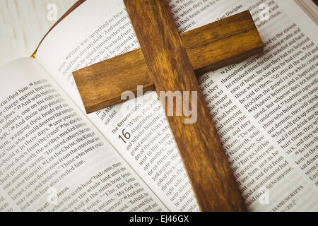 Open bible and wooden cross Stock Photo