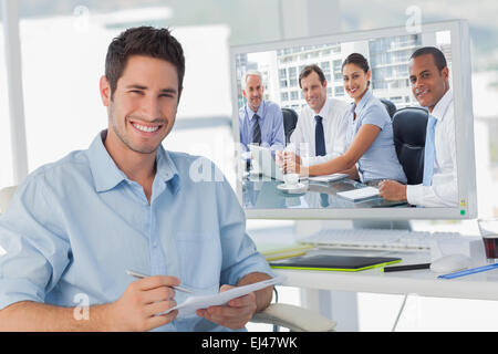 Composite image of business people brainstorming Stock Photo