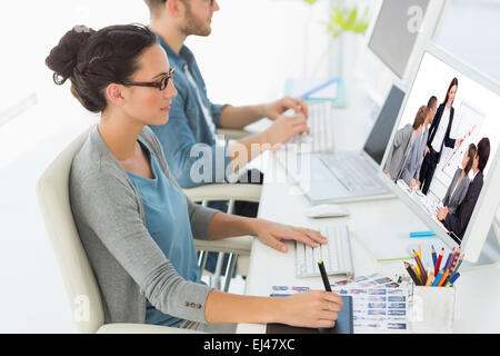 Composite image of assertive businesswoman giving a presentation Stock Photo