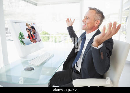 Composite image of three designers working together on a laptop Stock Photo