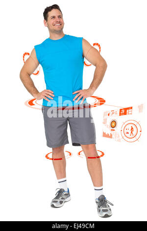 Composite image of full length portrait of a fit young man smiling Stock Photo