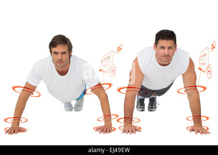 Composite image of portrait of two young men doing push ups Stock Photo