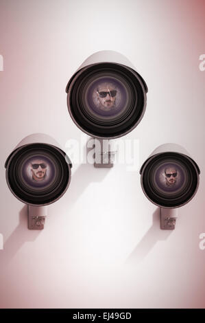 Composite image of close up of serious man wearing sunglasses Stock Photo