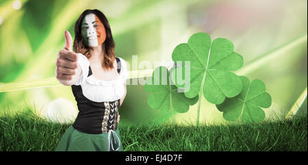 Composite image of irish girl showing thumbs up Stock Photo