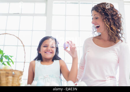 Happy girl holding easter egg Stock Photo