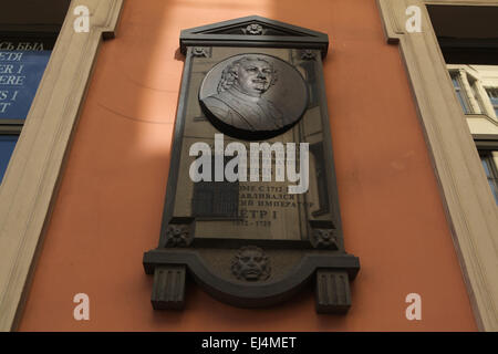 Commemorative plaque to Russian tsar Peter the Great on the House of Peter the Great at Palasta Street in Riga, Latvia. Text in Latvian and Russian: Emperor Peter the Great of Russia stayed in this house since the year 1712. Stock Photo