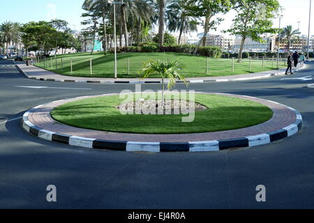 Mini roundabout outside the Hyatt Regency Hotel, Deira, Dubai, United Arab Emirates Stock Photo