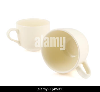 Two ceramic cream colored cups composition Stock Photo