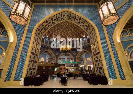 Starbucks coffee shop in ornate atrium at Ibn Battuta shopping mall in Dubai United Arab Emirates Stock Photo