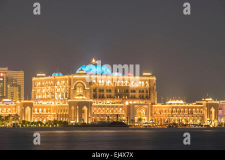 Exterior night view of luxury Emirates Palace Hotel in Abu Dhabi United Arab Emirates Stock Photo