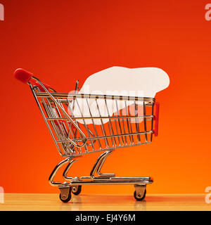 Car shape inside shopping cart Stock Photo