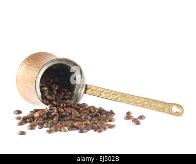 Copper cezve and coffee beans Stock Photo