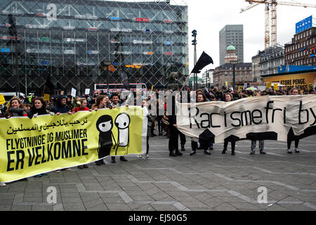 Copenhagen, Denmark, March 21st, 2015: The rally in support of UN’s International Day against Racism arrives at the Town Hall Square. The left sign reads: “Refugees and Muslims are welcome” and the right sign: “Racism Free City” Credit:  OJPHOTOS/Alamy Live News Stock Photo