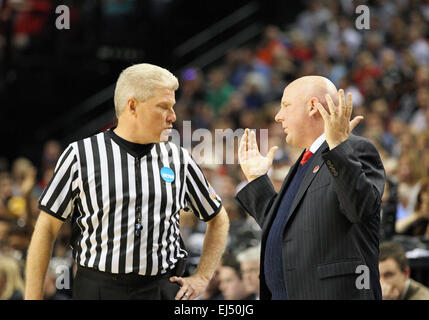 March 19, 2015: Eastern Washington Eagles head coach Jim Hayford discusses some questionable calls with a referee during the 2nd round of the 2015 NCAA Men's Basketball Championships at the Moda Center, Portland OR Stock Photo
