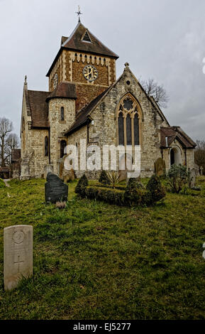 Parish Church of St Laurence Seale Surrey with Commonwealth War Graves Commission CWGC Great War typical headstone in foreground Stock Photo