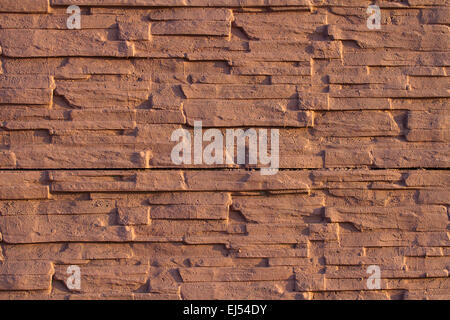 Background of colored stone wall  pattern texture Stock Photo