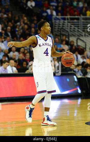 March 20, 2015: Kansas Jayhawks guard Devonte Graham (4) sets up a play in the first haf during the NCAA Men's Basketball Tournament Midwest Regional game between the New Mexico State Aggies and the Kansas Jayhawks at the Centurylink Center in Omaha, Nebraska. Kansas won the game 75-56. Kendall Shaw/CSM Stock Photo