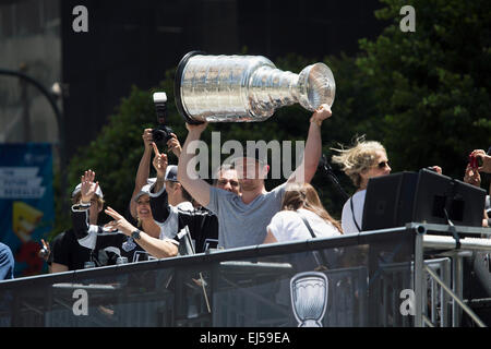 Goalie Jonathan Quick holds Stanley Cup, LA Kings 2014 Victory Parade, Los Angeles, California Stock Photo