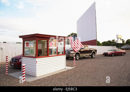 Cars in line buying tickets to Star Drive In Movie Theater, Montrose, Colorado, USA Stock Photo