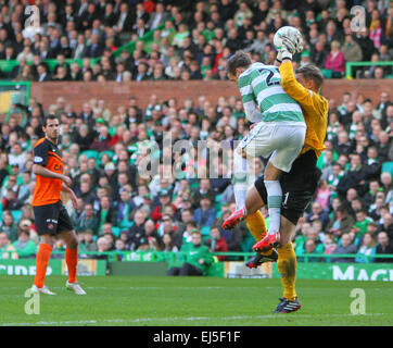 Glasgow, Scotland. 21st Mar, 2015. Scottish Premiership. Celtic versus Dundee United. Stefan Johansen crashes into Radoslaw Cierzniak Credit:  Action Plus Sports/Alamy Live News Stock Photo