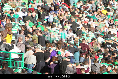 Glasgow, Scotland. 21st Mar, 2015. Scottish Premiership. Celtic versus Dundee United. Celtic supports enjoy a huddle in the sun Credit:  Action Plus Sports/Alamy Live News Stock Photo